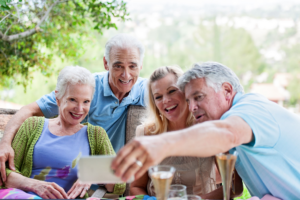group of seniors showing photos